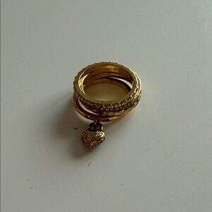 Juicy Couture gold ring stack